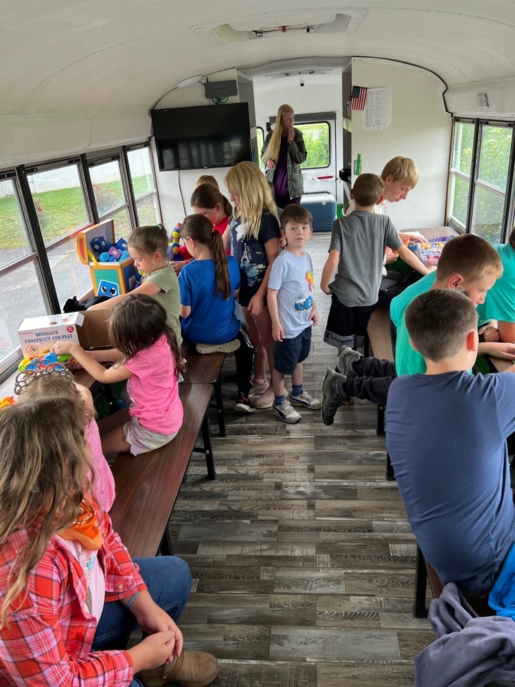 Students on a stem bus